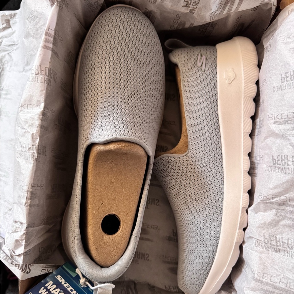 Skechers women’s Light Gray Slip-On Sneakers